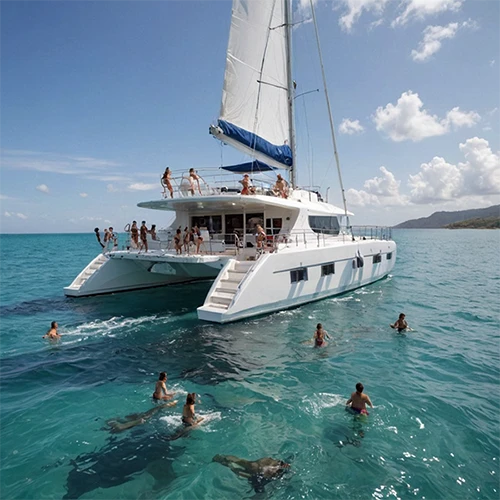 Catamaran in ocean with naked people swimming